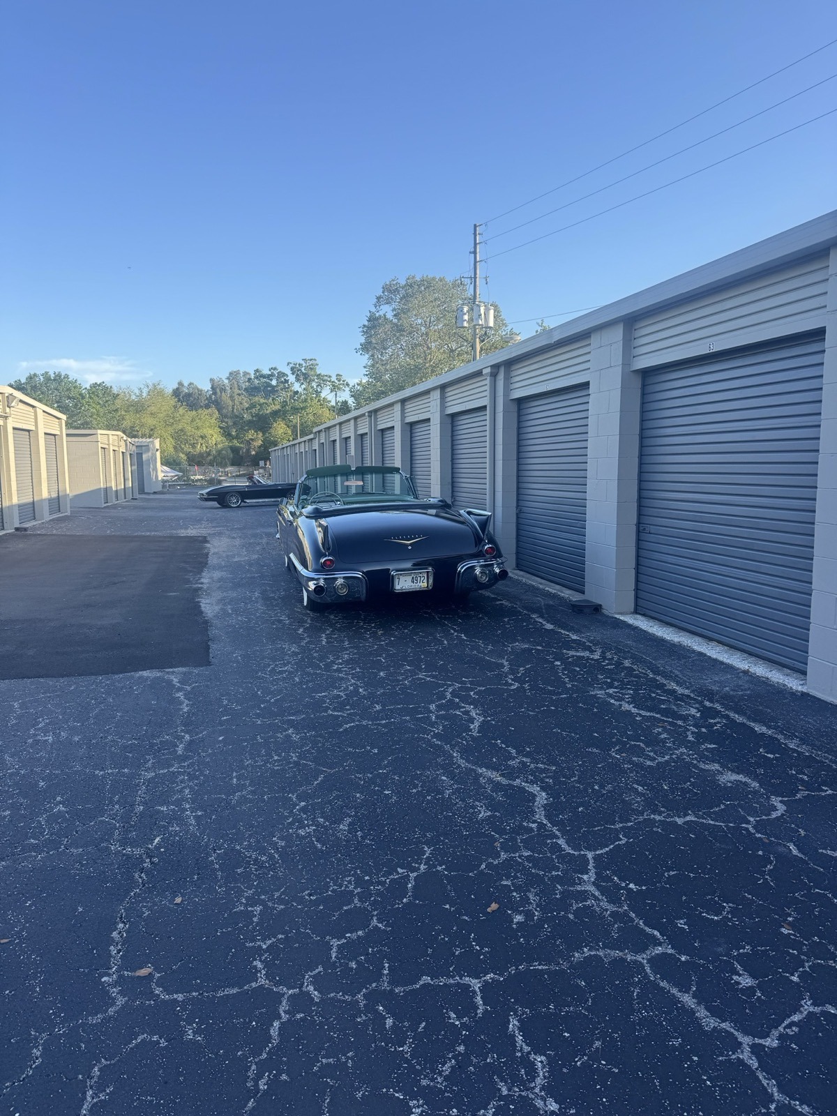 Classic Cadillac convertible parked at self storage unit in Clearwater FL